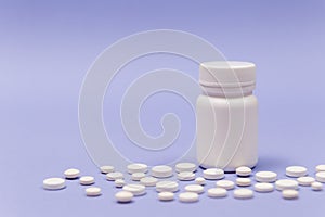 Pills spilling out of pill bottle. Pharmaceutical industry. Pharmacy