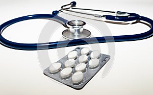 Pills and Stethoscope. Medical issues