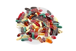 Pills and supplements on white background