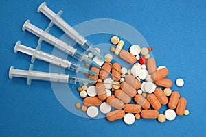 Pills and syringes