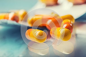 Pills Tablets Capsule or Medicament freely laid on glass background