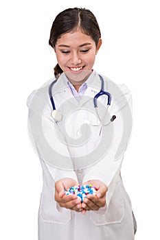 Pills, tablets and drugs heap in doctor`s hand