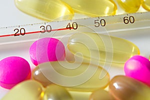 Pills and thermometer