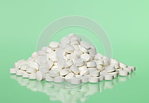 Pills toward green background