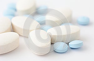 Pills on white background