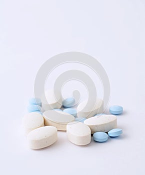 Pills on white background