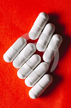 Pills in white capsules