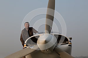 Pilot with the aircraft after landing photo