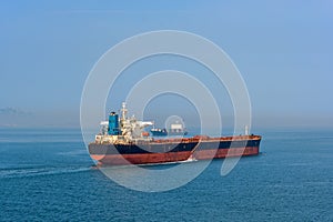Pilot boat and bulk carrier cargo ship
