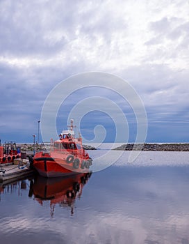 Pilot Boat At Harbor on Calm Evening