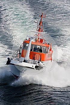 Pilot boat rushing through waves, Norway - Scandinavia