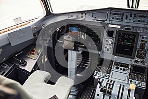 Pilot cabin in modern passenger airplane jet