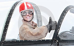 Pilot in cockpit.