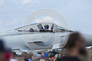 Pilot in the cockpit of a modern jet fighter.