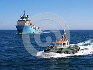 Pilot Cutter Escorting Offshore Vessel.