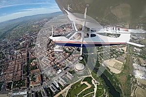 PILOT FLYING OVER THE CITY OF LOGROÃ‘O IN A PLANE