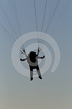 Pilot flying paraglide