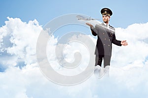 Pilot in the form of extending a hand to airplane