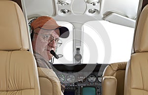 Pilot looking at passenger compartment photo