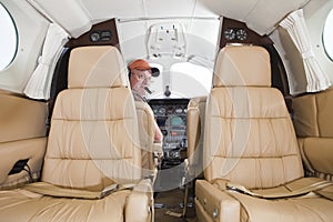 Pilot looking at passenger compartment