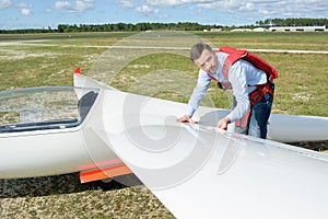 Pilot looking at wing sailplane