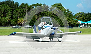 pilot making preflight checks