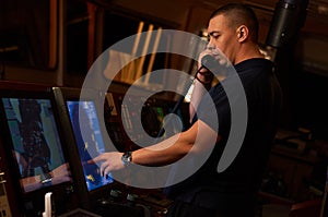 Pilot / Navigator on the ship`s bridge