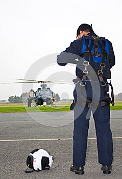 Pilot near helicopter