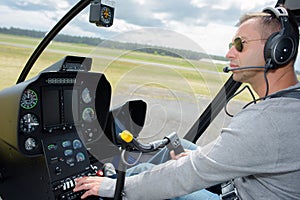 Pilot operating controls in cockpit