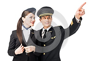 Pilot pointing showing stewardess something