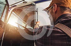Pilot Preparing for Flight in a Small Aircraft During Sunset