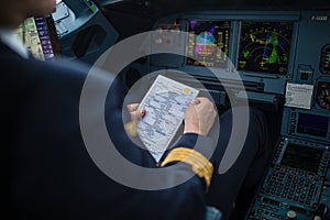 Pilot`s hand accelerating on the throttle in  a commercial airliner