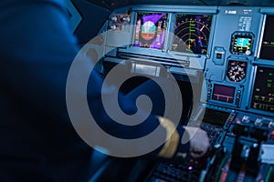 Pilot`s hand accelerating on the throttle in  a commercial airliner