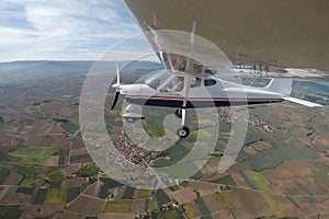 PILOT IN A SINGLE-ENGINE AIRPLANE FLYING IN THE PROVINCE OF LA RIOJA photo