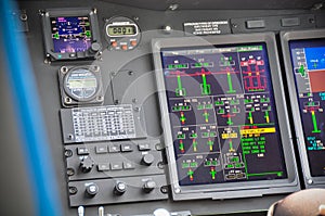 The pilots' control panel inside a passenger airplane, Control panel of airplane photo