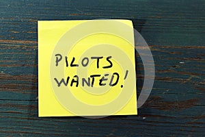 Pilots wanted post it on wood
