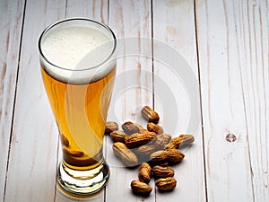 Pilsner beer and peanuts