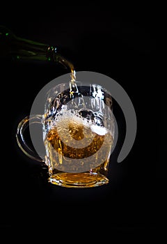 Pilsner mug of beer with foam