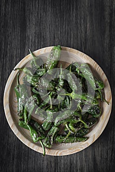 Pimientos padron grilled spanish green chilli peppers tapas snack photo