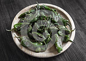 Pimientos padron grilled spanish green chilli peppers tapas snack photo