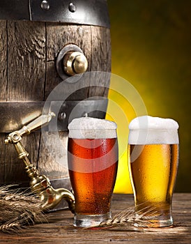 Pin of beer and glass of beer.