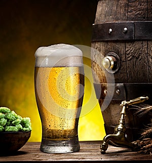 Pin of beer and glass of beer.