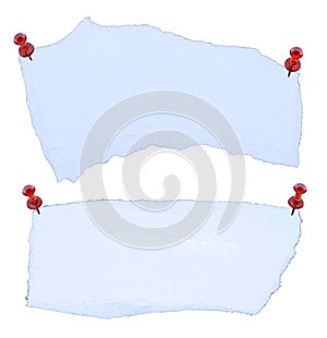 Pin on torn paper isolated on white background