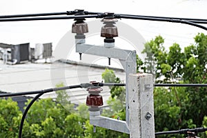 Pin Type High Voltage Insulators and Cable Installation on Concrete Electrical Pole