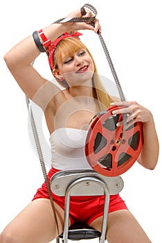 pin-up with a film reel, on white