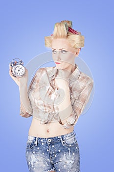 Pin up girl with alarm clock