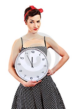 Pin-up girl holding clock