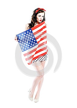 Pin up girl posing with american flag