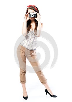 Pin up girl style, woman with retro camera