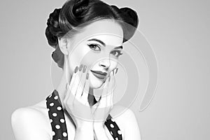 Pin up girl vintage. Beautiful woman pinup style portrait in retro dress and makeup, manicure nails hands, red lipstick and polka